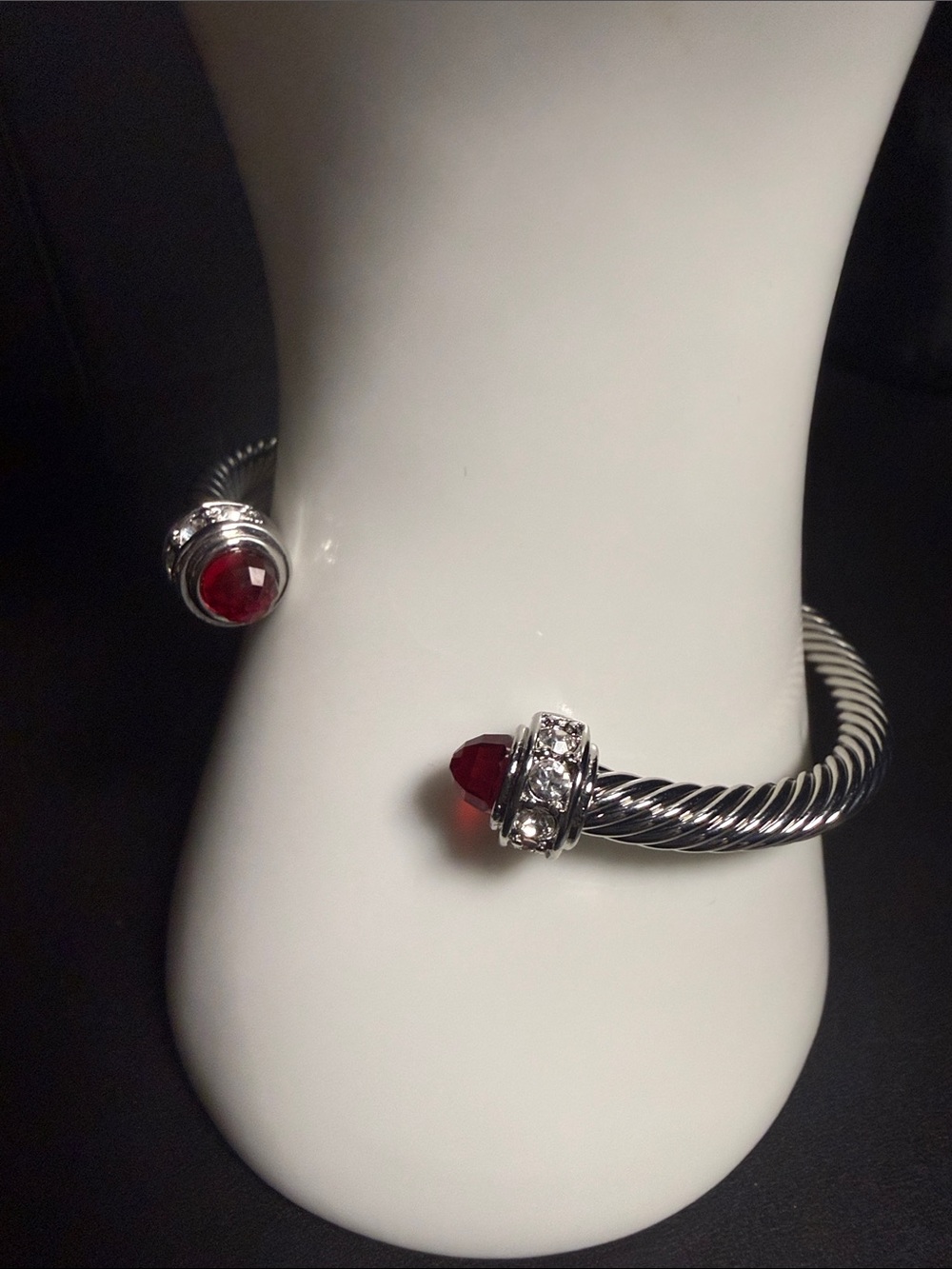 Silver-Tone Twisted Cuff Bracelet with Red Gemstone Accent